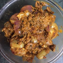 A picture of Oil free chatpata stuffed onions ki sabji.