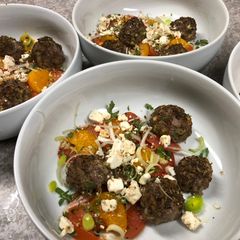 A picture of Mini Meatballs w/ Mandarin Orange Garlic Tomatoes.