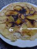 Panqueque de manzanas flambeado al rum de Bigote cocina