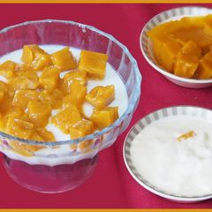 A picture of Honeyed curd with mango jelly topping.