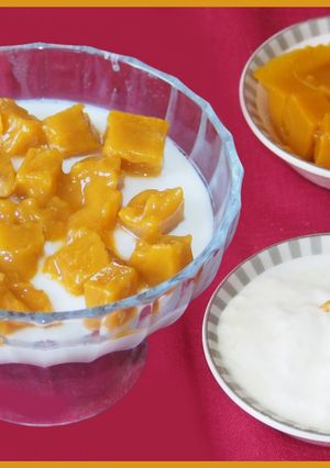 A picture of Honeyed curd with mango jelly topping.