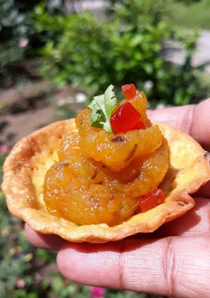 A picture of Puri tarts with pumpkin curry.