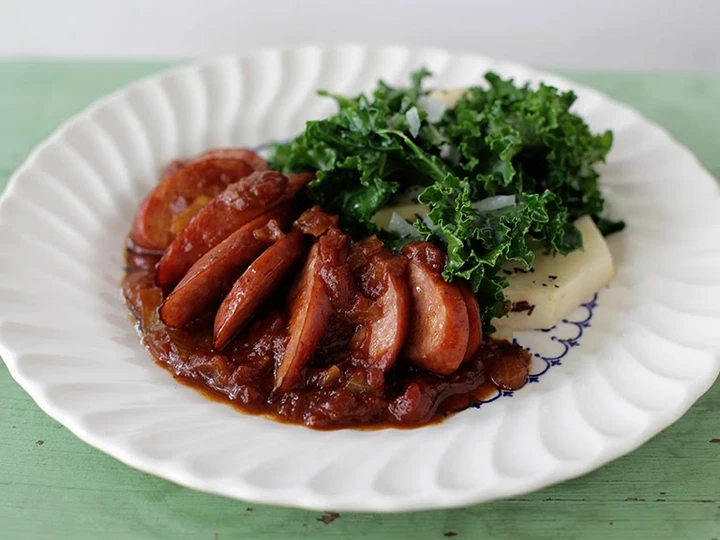 Easy Steps to Make Spotted Trotter Chicken Currywurst Stewed in a Madras Curry Sauce with Russet Potatoes and Kale the So Delicious Perfect