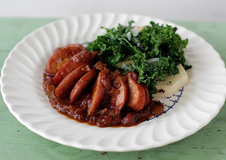 Spotted Trotter Chicken Currywurst Stewed in a Madras Curry Sauce with Russet Potatoes and Kale