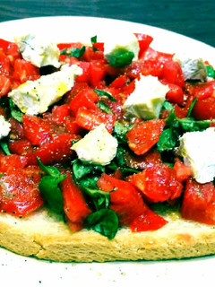 Una foto de Bruschettone queso brie