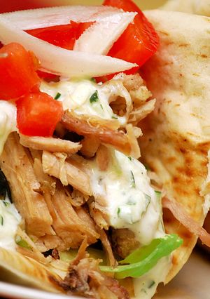 A picture of Grilled Pork Pitas w/Cucumber Mint Sauce.
