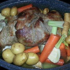 A picture of Pork Roast with root veggies.