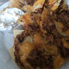 A picture of Pulled Pork Nachos.