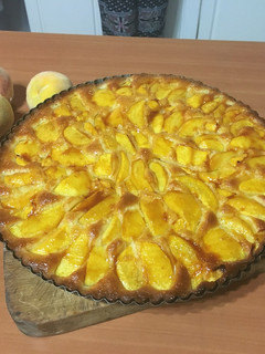 Una foto de Kuchen de durazno