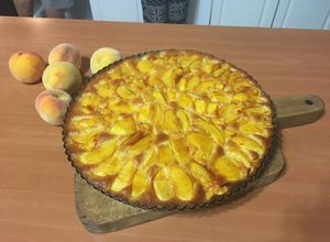 Una foto de Kuchen de durazno