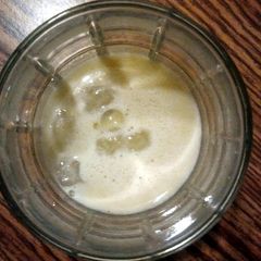 A picture of Apple, orange, banana smoothie.