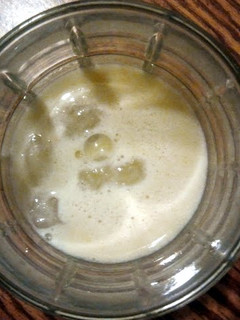 A picture of Apple, orange, banana smoothie.