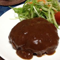 A picture of Homemade Hamburger Steaks Simmered in Demi-glace Sauce.