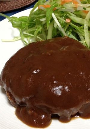A picture of Homemade Hamburger Steaks Simmered in Demi-glace Sauce.
