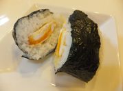 A picture of rice ball with egg