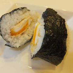 A picture of Onigiri (Rice Ball) with Fried Egg.