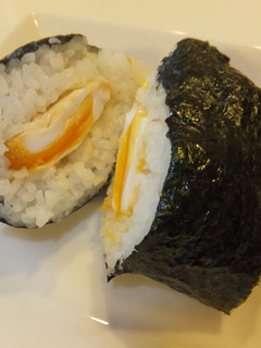 A picture of Onigiri (Rice Ball) with Fried Egg.