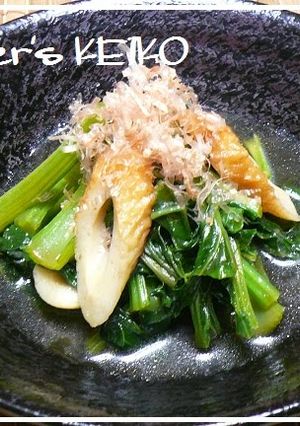 A picture of Farmhouse Recipe - Komatsuna Greens and Chikuwa Simmered in a Light Broth.