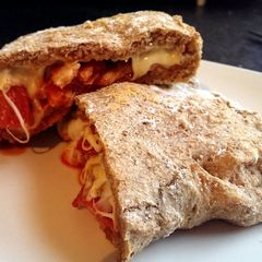 A picture of Sophie's wholemeal tomato dough meat feast pizza pocket.