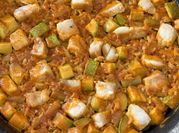 Una foto de arroz con corvina