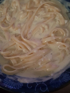 A picture of Fettucine with Alfredo sauce.