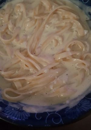 A picture of Fettucine with Alfredo sauce.