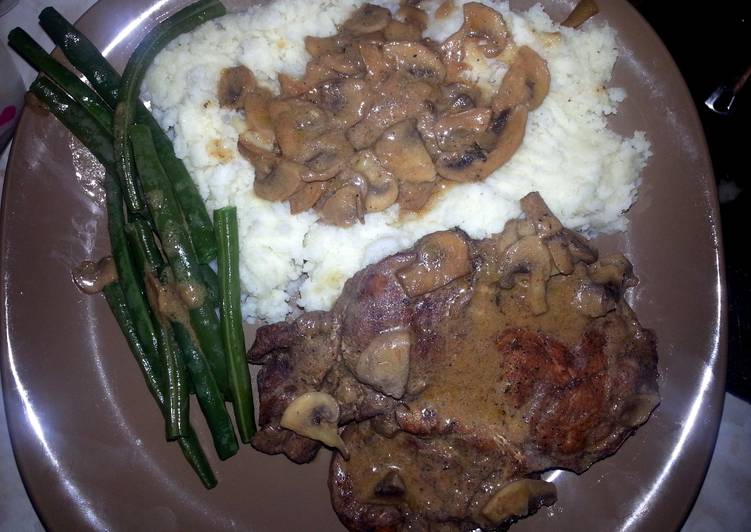 Pork Chop With sauteed mushrooms Pork Chop With sauteed mushrooms