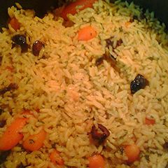 A picture of Rice olives and carrots.