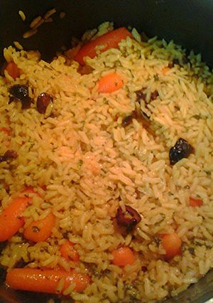 A picture of Rice olives and carrots.