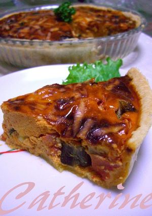 A picture of Tomato Cream Quiche with Eggplants and Tomatoes.