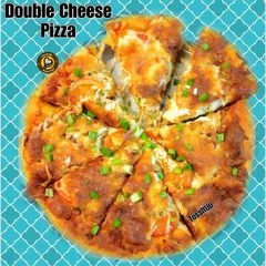 A picture of Double Cheese Pizza with homemade crust.