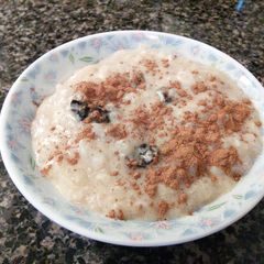A picture of Almond Milk Rice Pudding With Raisins .
