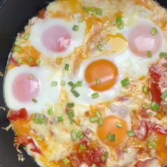 A picture of Breakfast with Eggs and Cabbage.