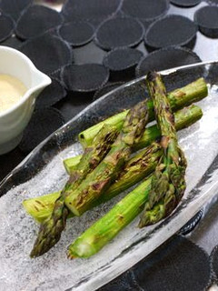 A picture of Grilled Asparagus in Garlic, Oyster Sauce, and Mayonnaise.