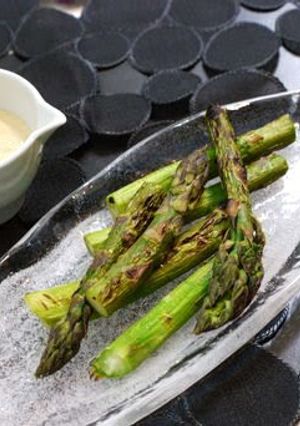 A picture of Grilled Asparagus in Garlic, Oyster Sauce, and Mayonnaise.