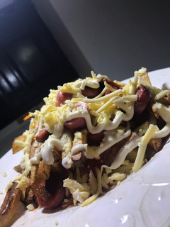 Una foto de Salchipapas bien callejeras