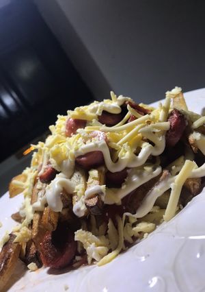 Una foto de Salchipapas bien callejeras