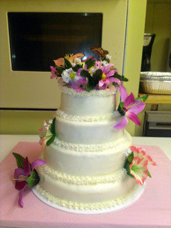 A picture of Orange supreme cake with buttercream frosting.