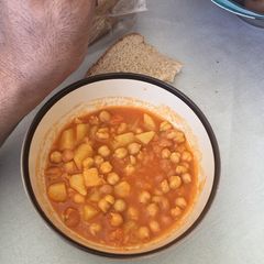 A picture of Chickpeas and potato soup.