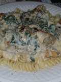 Chicken & shrimp with a garlic - feta cheese florintine sauce