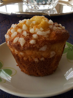 A picture of AMIEs BANANA Muffins with Cream Cheese frosting.