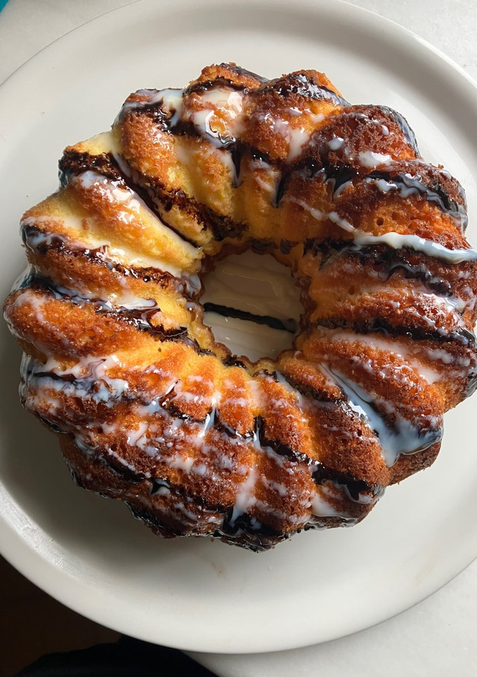 Una foto de Bizcocho de naranja, kéfir y miel, con relleno de confitura casera de kumquat