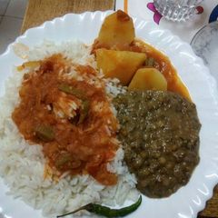 A picture of Coconut Ndengu(green grams) with rice.