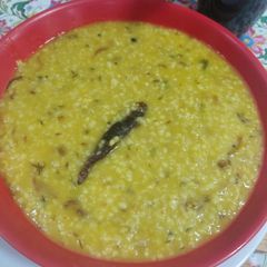 A picture of Moong dal dalia broken weat.
