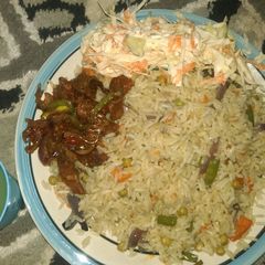 A picture of White fried rice,pepper meat with coils low.