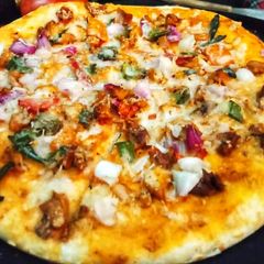 A picture of Chicken fajita pizza.