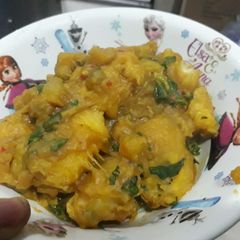 A picture of Yam with scent leaves porriage.