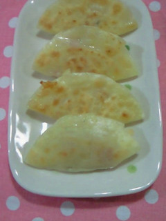 A picture of Onion and Bacon Gyoza Dumplings.