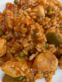A picture of Rice with Chicken and Vegetables 👍.