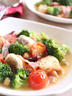 A picture of Colorful Cod Fillets Sauteed and Steamed with Consommé and Butter.